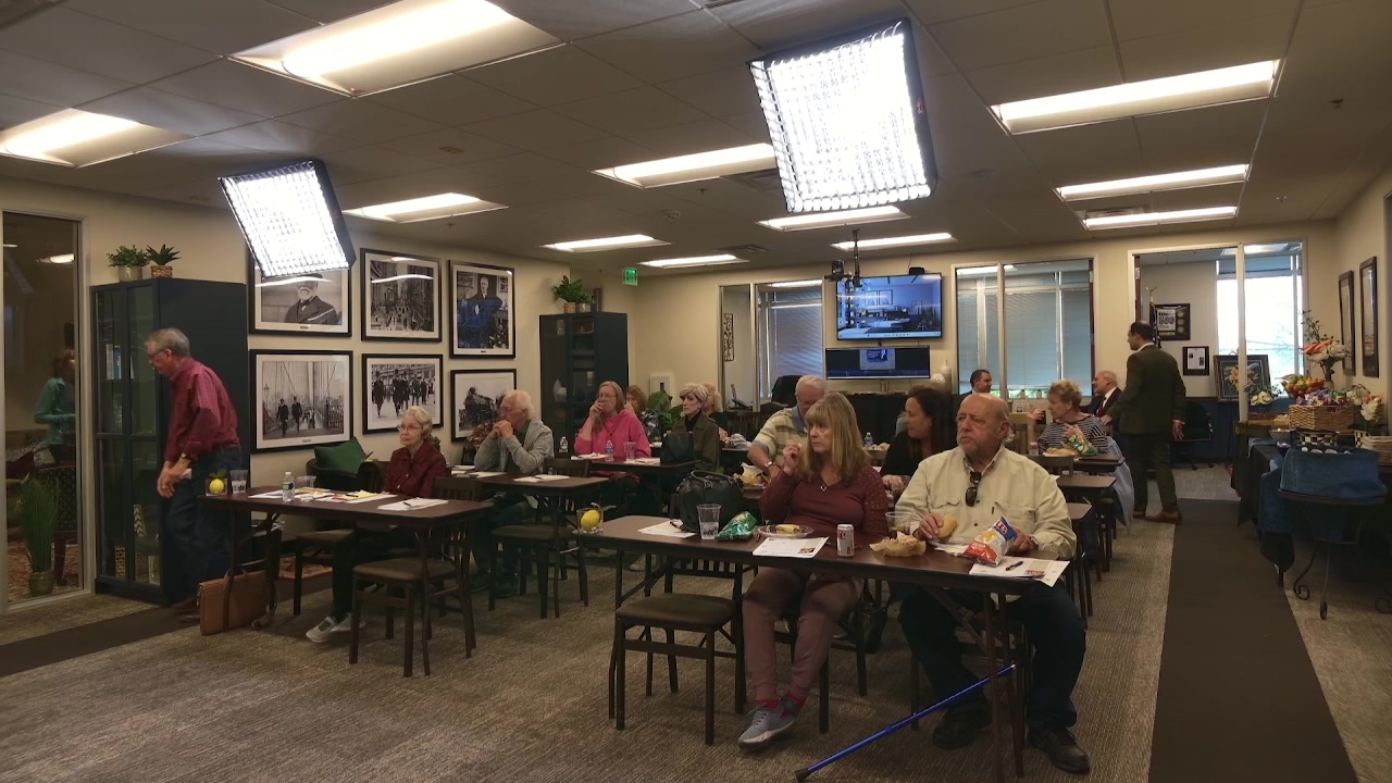 A relaxed afternoon workshop session, attendees at classroom tables